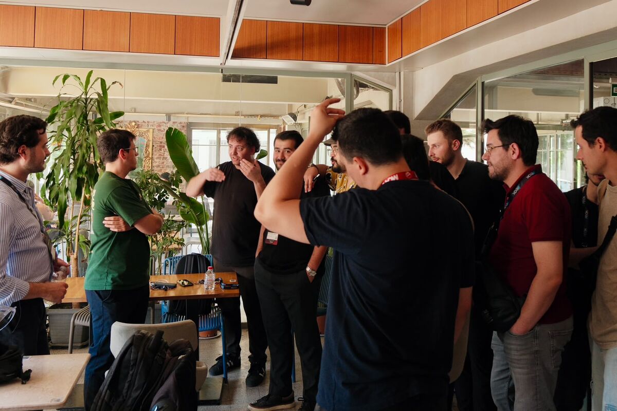 Builders raising a toast at the Build Station