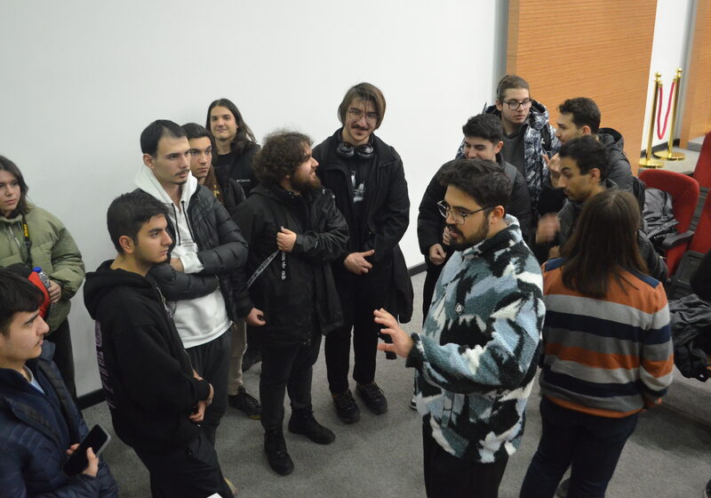 Participants gathered between sessions at an event
