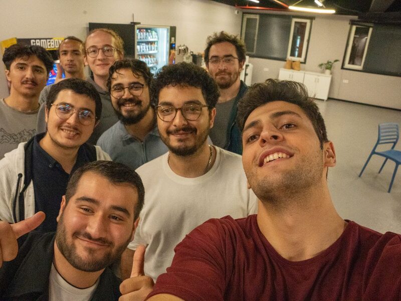 Members of the studio together after a build weekend